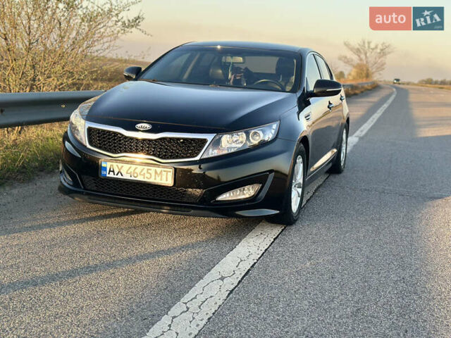 Черный Киа K5, объемом двигателя 2 л и пробегом 256 тыс. км за 9000 $, фото 13 на Automoto.ua