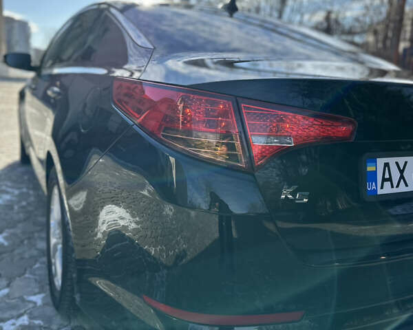 Черный Киа K5, объемом двигателя 2 л и пробегом 256 тыс. км за 9000 $, фото 18 на Automoto.ua