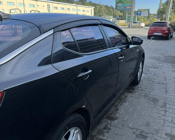 Чорний Кіа K5, об'ємом двигуна 2 л та пробігом 269 тис. км за 8600 $, фото 20 на Automoto.ua