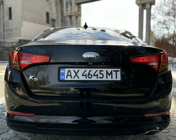 Черный Киа K5, объемом двигателя 2 л и пробегом 256 тыс. км за 9000 $, фото 17 на Automoto.ua