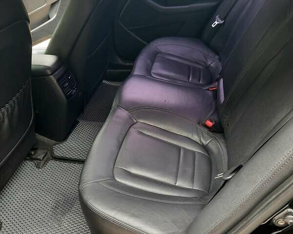 Чорний Кіа K5, об'ємом двигуна 2 л та пробігом 237 тис. км за 8500 $, фото 5 на Automoto.ua