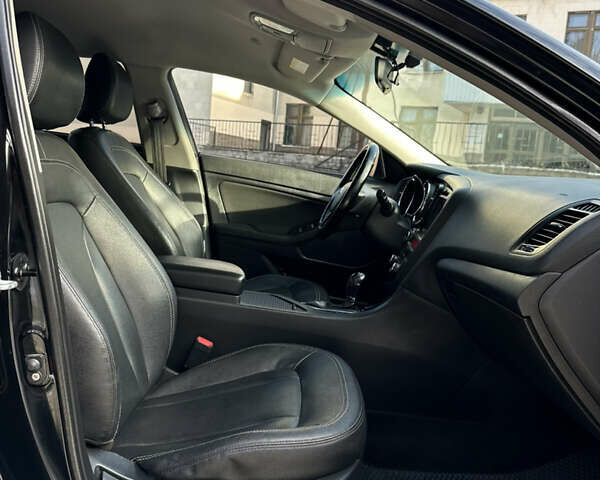 Черный Киа K5, объемом двигателя 2 л и пробегом 256 тыс. км за 9000 $, фото 23 на Automoto.ua