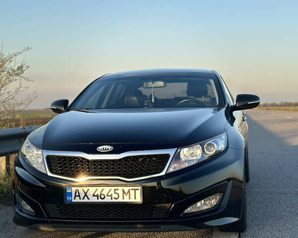 Черный Киа K5, объемом двигателя 2 л и пробегом 256 тыс. км за 9000 $, фото 11 на Automoto.ua