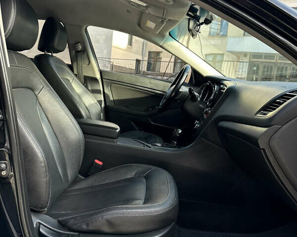 Черный Киа K5, объемом двигателя 2 л и пробегом 256 тыс. км за 9000 $, фото 22 на Automoto.ua