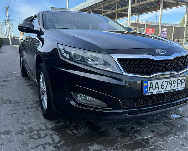 Чорний Кіа K5, об'ємом двигуна 2 л та пробігом 269 тис. км за 8600 $, фото 1 на Automoto.ua