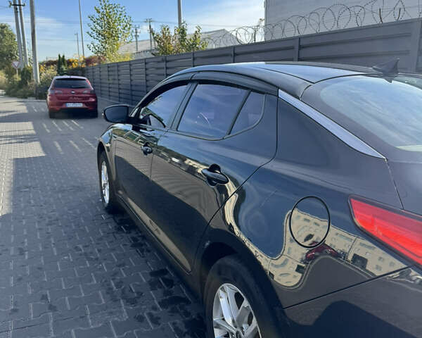 Чорний Кіа K5, об'ємом двигуна 2 л та пробігом 269 тис. км за 8600 $, фото 6 на Automoto.ua