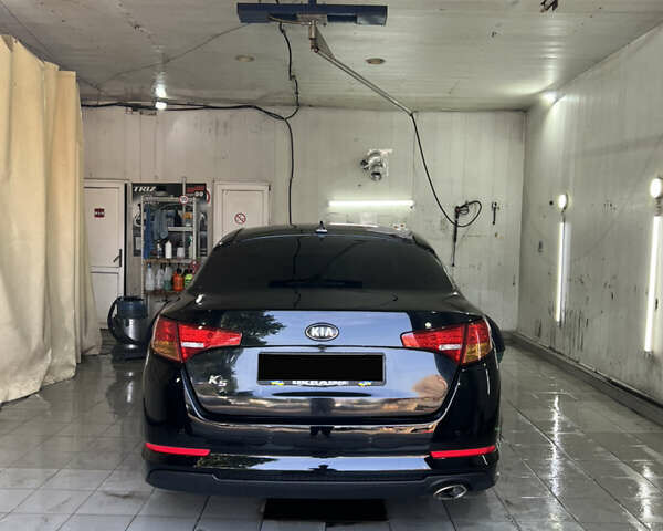 Черный Киа K5, объемом двигателя 2 л и пробегом 445 тыс. км за 6500 $, фото 12 на Automoto.ua