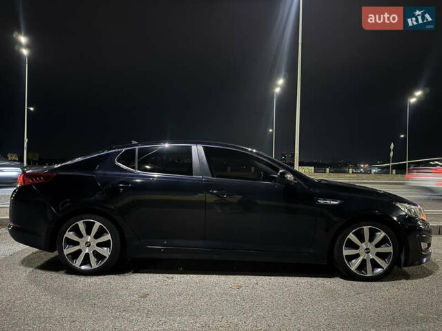 Черный Киа K5, объемом двигателя 2 л и пробегом 284 тыс. км за 9450 $, фото 7 на Automoto.ua