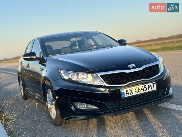 Черный Киа K5, объемом двигателя 2 л и пробегом 256 тыс. км за 9000 $, фото 10 на Automoto.ua