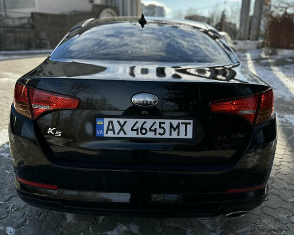 Черный Киа K5, объемом двигателя 2 л и пробегом 256 тыс. км за 9000 $, фото 16 на Automoto.ua