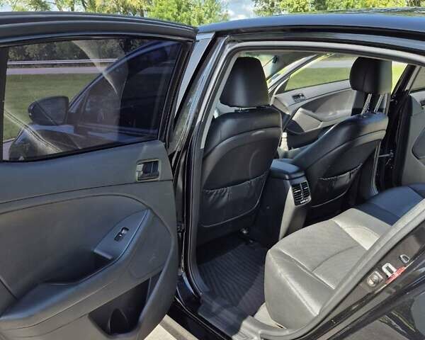 Черный Киа K5, объемом двигателя 2 л и пробегом 179 тыс. км за 9200 $, фото 12 на Automoto.ua
