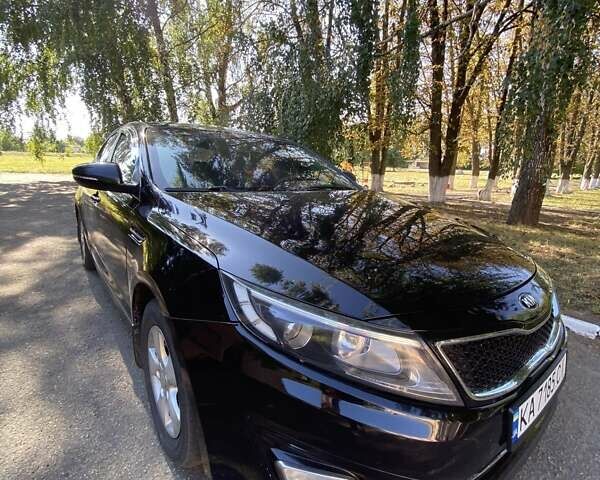 Чорний Кіа K5, об'ємом двигуна 2 л та пробігом 209 тис. км за 8200 $, фото 4 на Automoto.ua