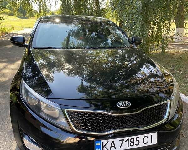 Чорний Кіа K5, об'ємом двигуна 2 л та пробігом 209 тис. км за 8200 $, фото 1 на Automoto.ua