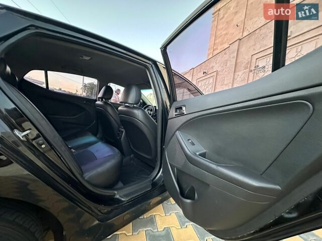 Черный Киа K5, объемом двигателя 2 л и пробегом 305 тыс. км за 8500 $, фото 39 на Automoto.ua