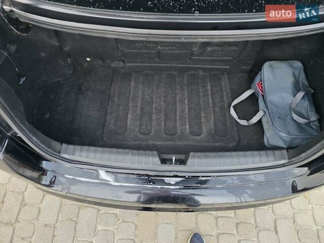 Черный Киа K5, объемом двигателя 2 л и пробегом 408 тыс. км за 6400 $, фото 7 на Automoto.ua