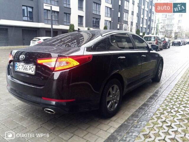 Черный Киа K5, объемом двигателя 2 л и пробегом 255 тыс. км за 9750 $, фото 7 на Automoto.ua