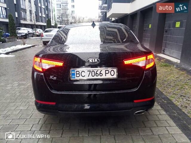 Черный Киа K5, объемом двигателя 2 л и пробегом 255 тыс. км за 9750 $, фото 9 на Automoto.ua