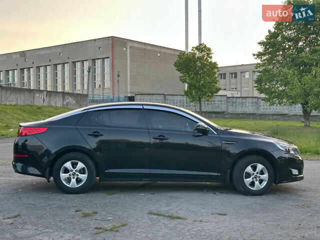 Черный Киа K5, объемом двигателя 2 л и пробегом 136 тыс. км за 8600 $, фото 1 на Automoto.ua