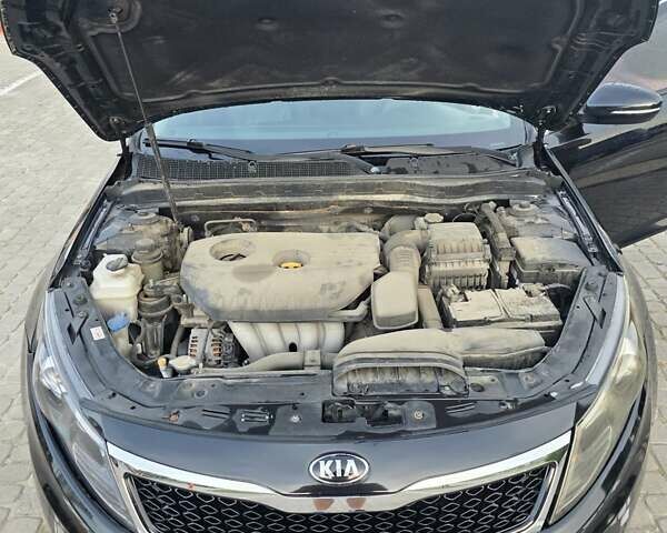 Черный Киа K5, объемом двигателя 2 л и пробегом 408 тыс. км за 6400 $, фото 13 на Automoto.ua