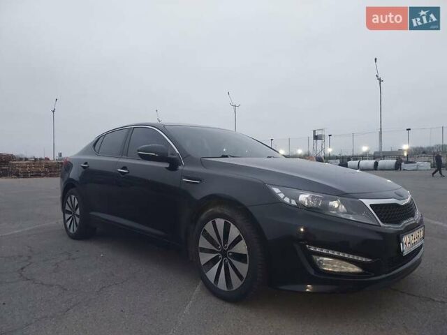 Черный Киа K5, объемом двигателя 2 л и пробегом 281 тыс. км за 11200 $, фото 6 на Automoto.ua