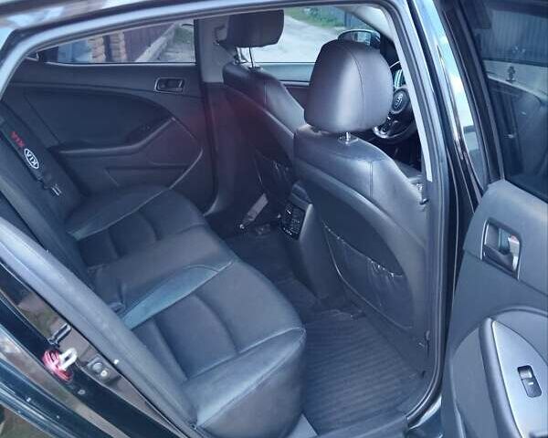 Черный Киа K5, объемом двигателя 2 л и пробегом 200 тыс. км за 9200 $, фото 17 на Automoto.ua