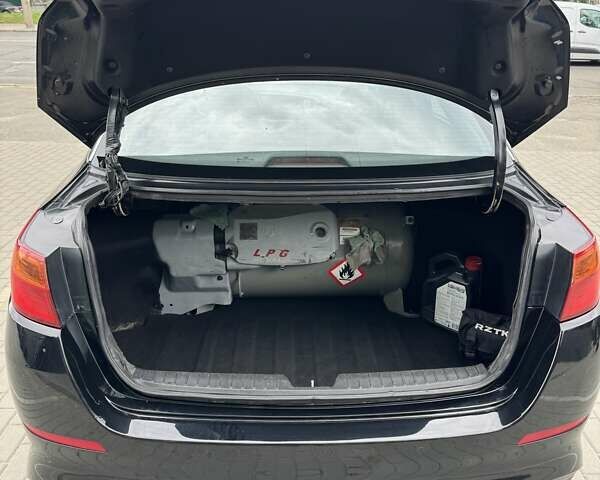 Чорний Кіа K5, об'ємом двигуна 2 л та пробігом 323 тис. км за 8500 $, фото 10 на Automoto.ua