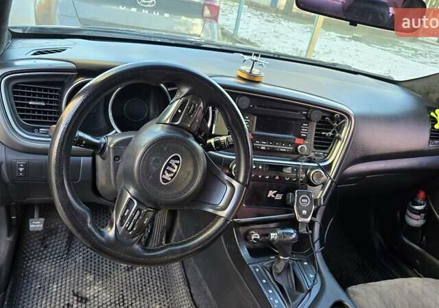 Черный Киа K5, объемом двигателя 2 л и пробегом 440 тыс. км за 8900 $, фото 12 на Automoto.ua
