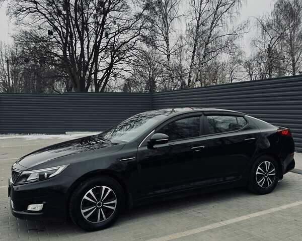 Черный Киа K5, объемом двигателя 2 л и пробегом 321 тыс. км за 8100 $, фото 4 на Automoto.ua