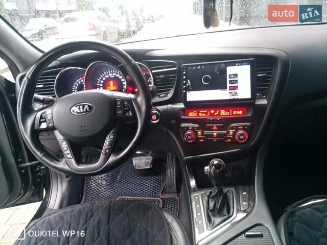 Черный Киа K5, объемом двигателя 2 л и пробегом 255 тыс. км за 9750 $, фото 16 на Automoto.ua