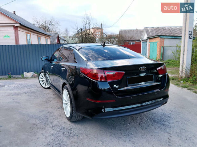 Черный Киа K5, объемом двигателя 2 л и пробегом 200 тыс. км за 9200 $, фото 15 на Automoto.ua