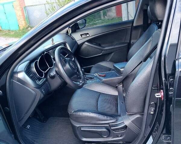 Черный Киа K5, объемом двигателя 2 л и пробегом 200 тыс. км за 9200 $, фото 2 на Automoto.ua