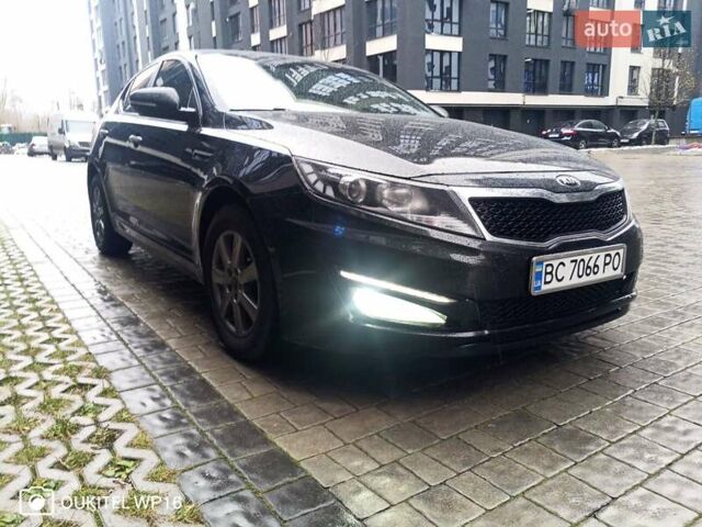 Черный Киа K5, объемом двигателя 2 л и пробегом 255 тыс. км за 9750 $, фото 4 на Automoto.ua