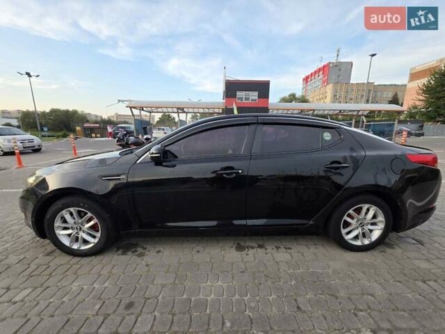 Черный Киа K5, объемом двигателя 2 л и пробегом 408 тыс. км за 6400 $, фото 8 на Automoto.ua