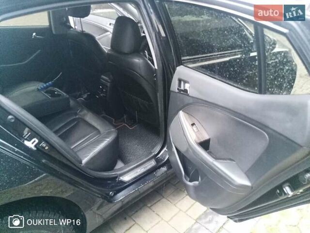 Черный Киа K5, объемом двигателя 2 л и пробегом 255 тыс. км за 9750 $, фото 15 на Automoto.ua