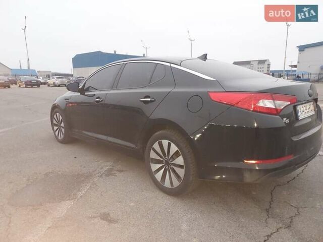 Черный Киа K5, объемом двигателя 2 л и пробегом 281 тыс. км за 11200 $, фото 4 на Automoto.ua