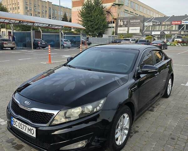 Черный Киа K5, объемом двигателя 2 л и пробегом 408 тыс. км за 6400 $, фото 2 на Automoto.ua