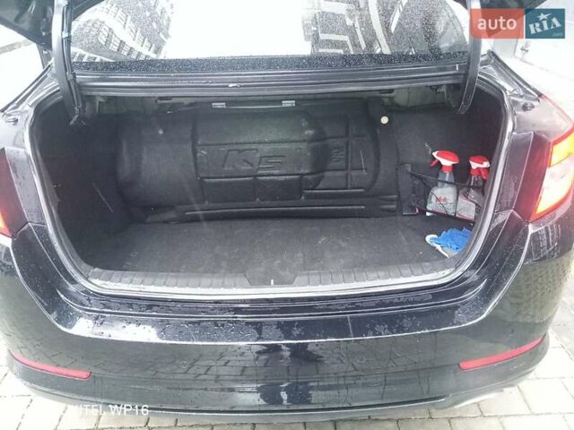 Черный Киа K5, объемом двигателя 2 л и пробегом 255 тыс. км за 9750 $, фото 10 на Automoto.ua