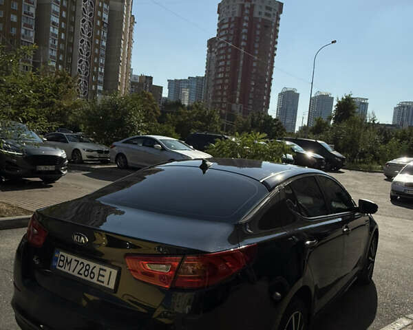 Черный Киа K5, объемом двигателя 2 л и пробегом 222 тыс. км за 9200 $, фото 5 на Automoto.ua