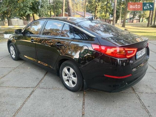 Черный Киа K5, объемом двигателя 2 л и пробегом 287 тыс. км за 7700 $, фото 12 на Automoto.ua