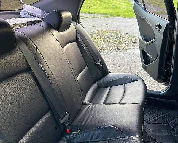 Черный Киа K5, объемом двигателя 2 л и пробегом 136 тыс. км за 8600 $, фото 14 на Automoto.ua
