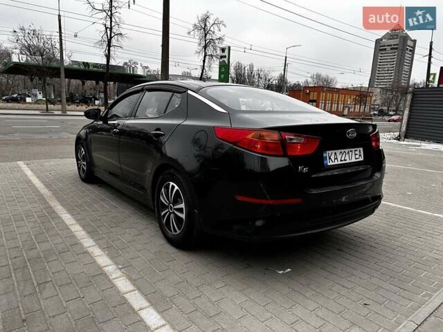 Черный Киа K5, объемом двигателя 2 л и пробегом 321 тыс. км за 8100 $, фото 3 на Automoto.ua
