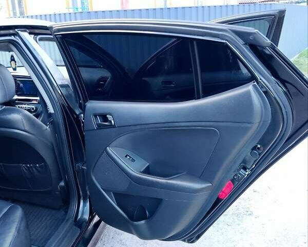 Черный Киа K5, объемом двигателя 2 л и пробегом 200 тыс. км за 9200 $, фото 11 на Automoto.ua