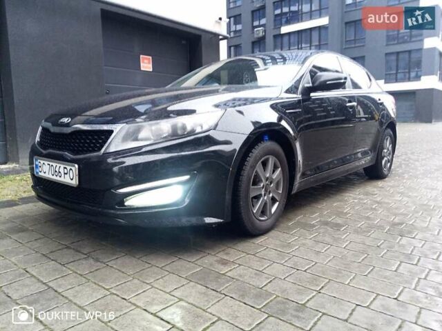 Черный Киа K5, объемом двигателя 2 л и пробегом 255 тыс. км за 9750 $, фото 5 на Automoto.ua
