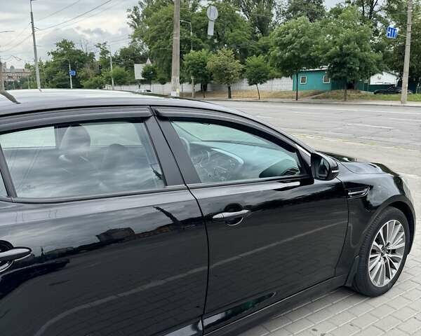 Чорний Кіа K5, об'ємом двигуна 2 л та пробігом 323 тис. км за 8500 $, фото 13 на Automoto.ua