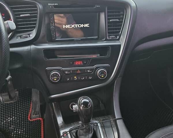Черный Киа K5, объемом двигателя 2 л и пробегом 408 тыс. км за 6400 $, фото 9 на Automoto.ua