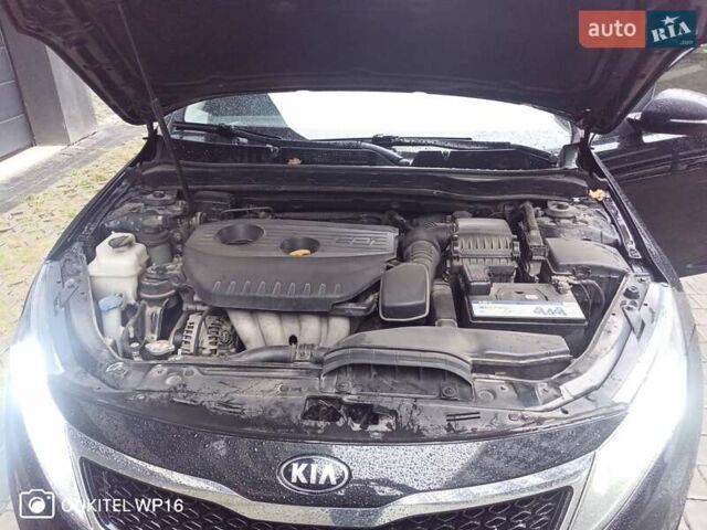 Черный Киа K5, объемом двигателя 2 л и пробегом 255 тыс. км за 9750 $, фото 11 на Automoto.ua