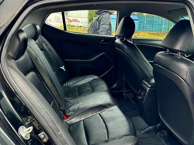 Черный Киа K5, объемом двигателя 2 л и пробегом 324 тыс. км за 9250 $, фото 2 на Automoto.ua