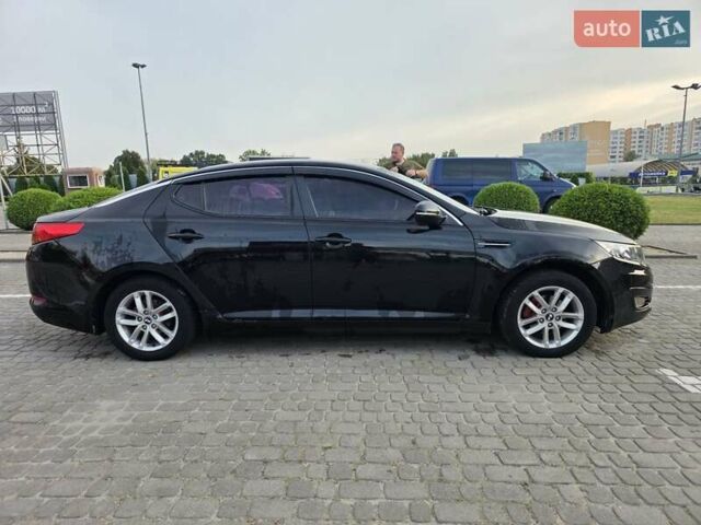 Черный Киа K5, объемом двигателя 2 л и пробегом 408 тыс. км за 6400 $, фото 3 на Automoto.ua
