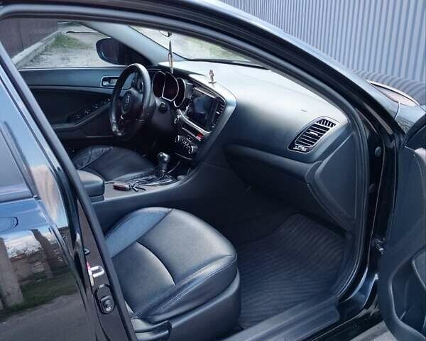 Черный Киа K5, объемом двигателя 2 л и пробегом 200 тыс. км за 9200 $, фото 18 на Automoto.ua