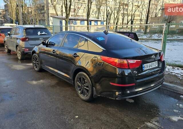 Черный Киа K5, объемом двигателя 2 л и пробегом 440 тыс. км за 8900 $, фото 17 на Automoto.ua